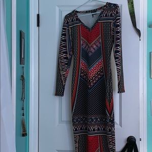 Long pattern dress right above the knee